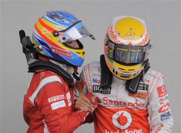 Lewis Hamilton y Fernando Alonso tras el GP de Alemania 2011