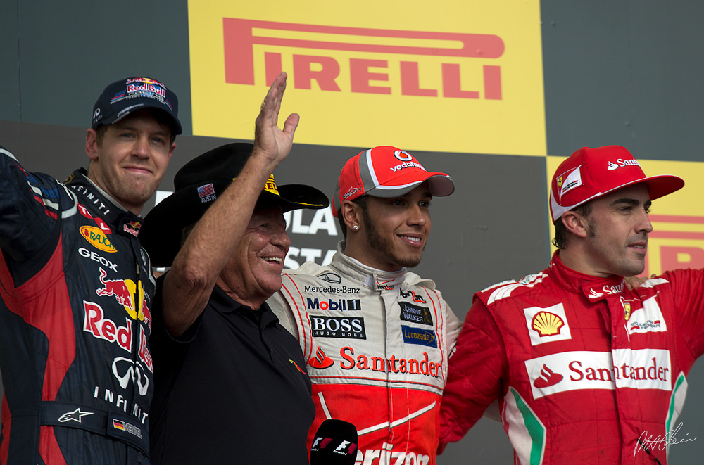 Sebastian Vettel, Lewis Hamilton y Fernando Alonso en el podio del GP de EE.UU. 2012