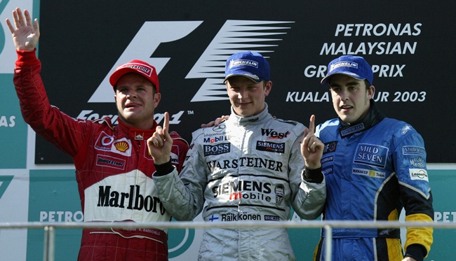 Barrichello, Raikkonen y Alonso en el podio de Malasia 2003