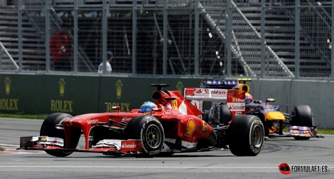 Fernando Alonso y Mark Webber durante el GP de Canadá 2013