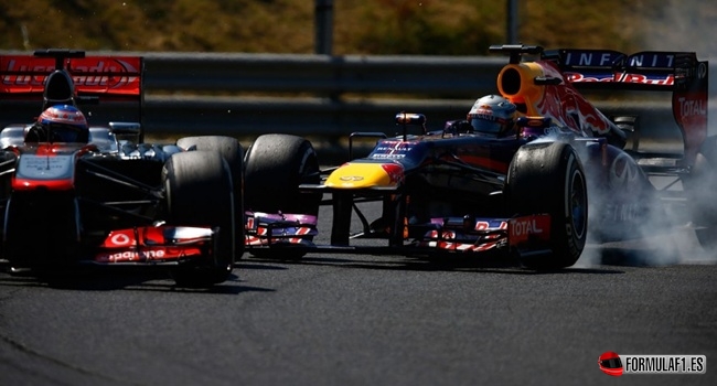 Jenson Button y Sebastian Vettel en Hungría 2013